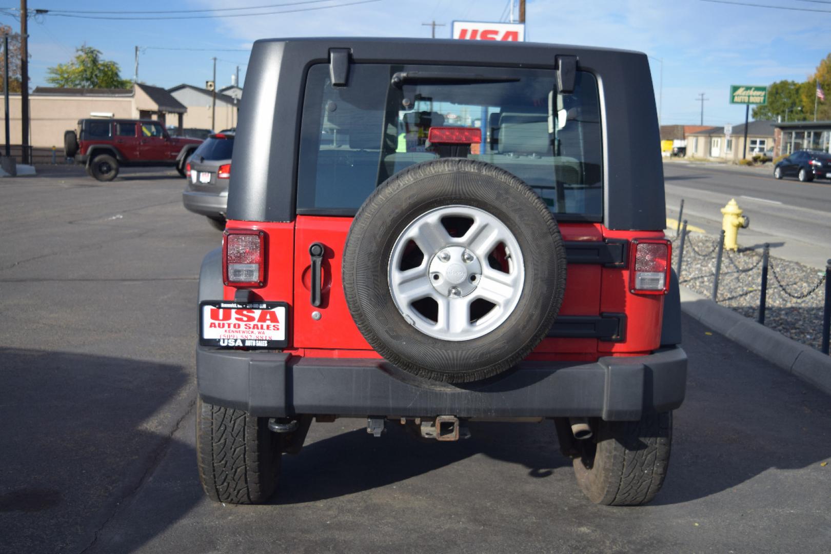 2010 RED /GRAY Jeep Wrangler Sport 4WD (1J4AA2D17AL) with an 3.8L V6 OHV 12V engine, 6-SPEED transmission, located at 607 W Columbia Drive, Kennewick, WA, 99336, (509) 987-1069, 46.216743, -119.126404 - FOR MORE INFORMATION PLEASE GIVE US A CALL TOLL FREE AT 509-582-8818 OR FOR MORE OPTIONS PLEASE VIEW OUR INVENTORY ON THE WEB AT USAAUTOSALES.NET Si te gusta este vehiculo y usted tiene preguntas, por favor llame gratis al numero (509) 582-8818 y alguien le ayudara. VEHICLE PRICE DOES NOT INCLUDE TA - Photo#3