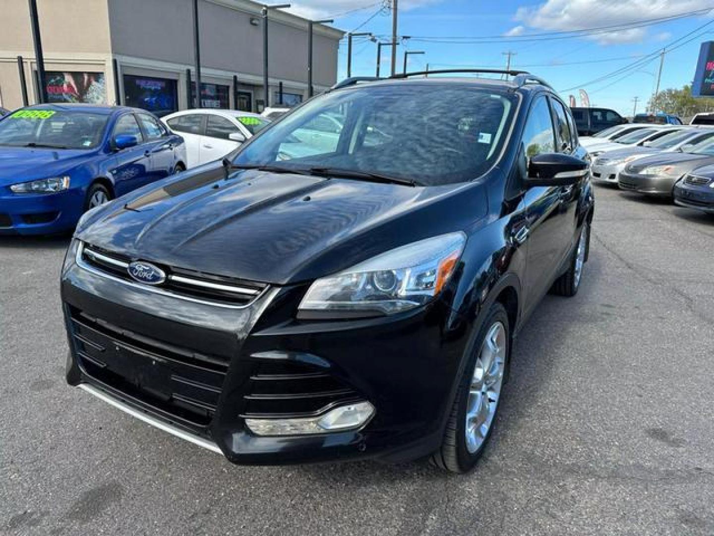 2014 Black /No Color Ford Escape Titanium Sport Utility 4D (1FMCU9J93EU) with an 4-Cyl, EcoBoost, 2.0L engine, Auto, 6-Spd w/SelShft transmission, located at 607 W Columbia Drive, Kennewick, WA, 99336, (509) 987-1069, 46.216743, -119.126404 - Photo#0