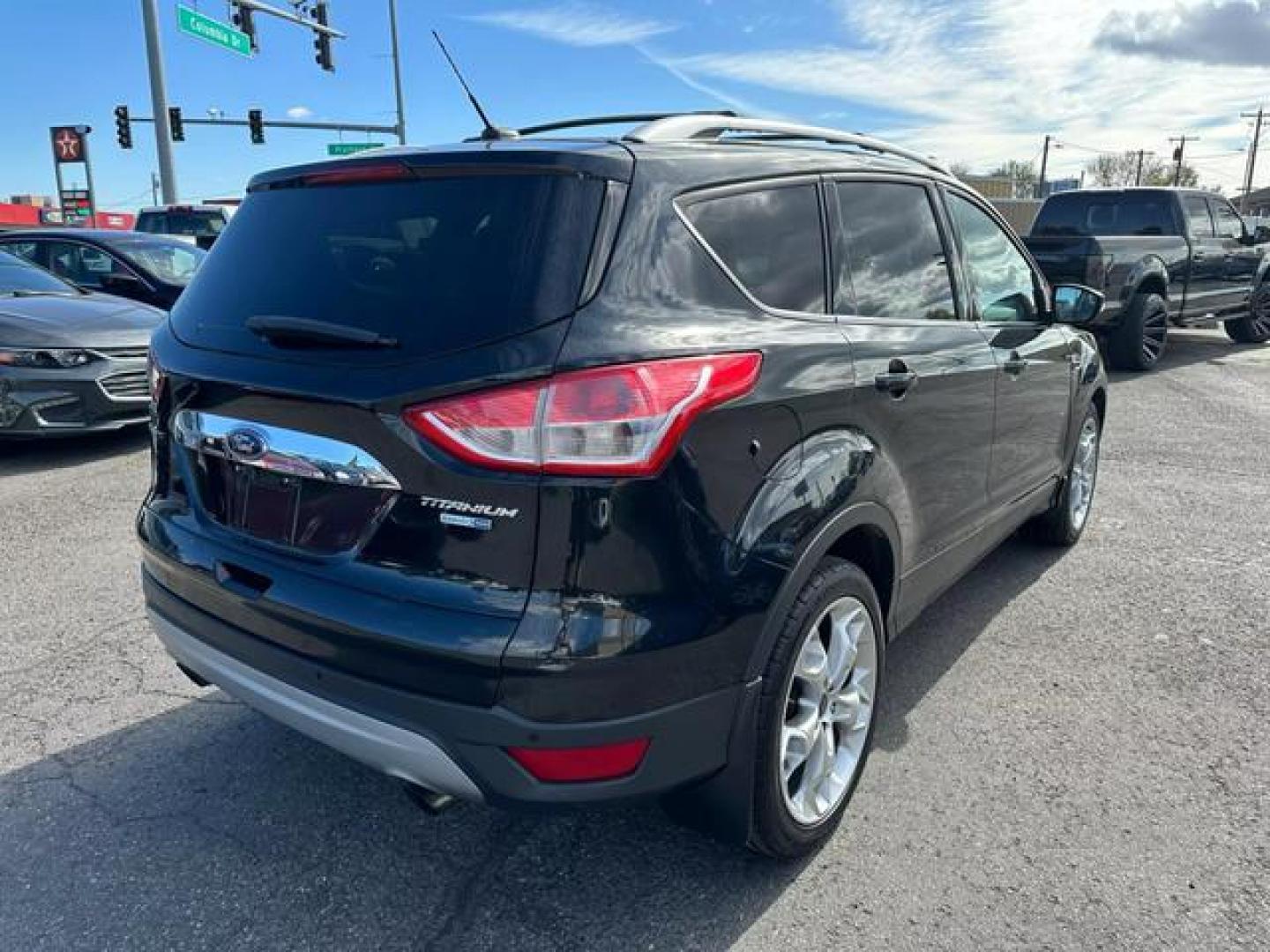 2014 Black /No Color Ford Escape Titanium Sport Utility 4D (1FMCU9J93EU) with an 4-Cyl, EcoBoost, 2.0L engine, Auto, 6-Spd w/SelShft transmission, located at 607 W Columbia Drive, Kennewick, WA, 99336, (509) 987-1069, 46.216743, -119.126404 - Photo#4