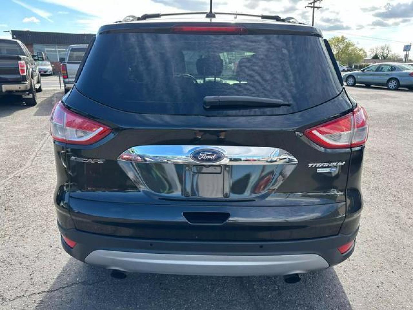 2014 Black /No Color Ford Escape Titanium Sport Utility 4D (1FMCU9J93EU) with an 4-Cyl, EcoBoost, 2.0L engine, Auto, 6-Spd w/SelShft transmission, located at 607 W Columbia Drive, Kennewick, WA, 99336, (509) 987-1069, 46.216743, -119.126404 - Photo#5