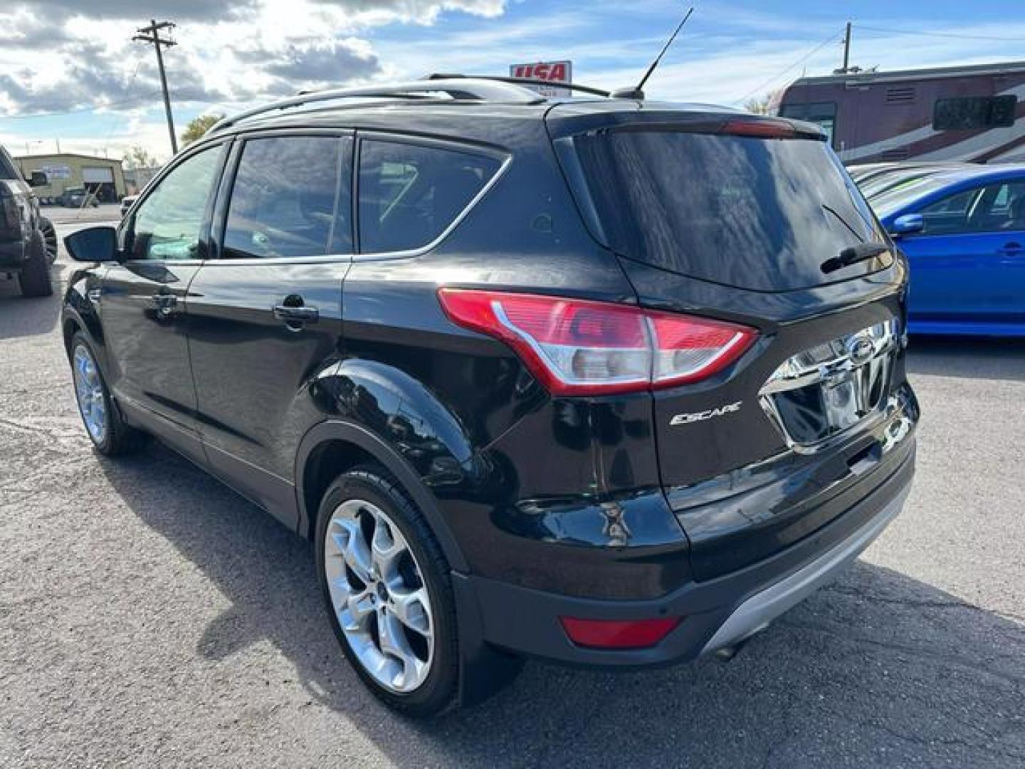 2014 Black /No Color Ford Escape Titanium Sport Utility 4D (1FMCU9J93EU) with an 4-Cyl, EcoBoost, 2.0L engine, Auto, 6-Spd w/SelShft transmission, located at 607 W Columbia Drive, Kennewick, WA, 99336, (509) 987-1069, 46.216743, -119.126404 - Photo#6