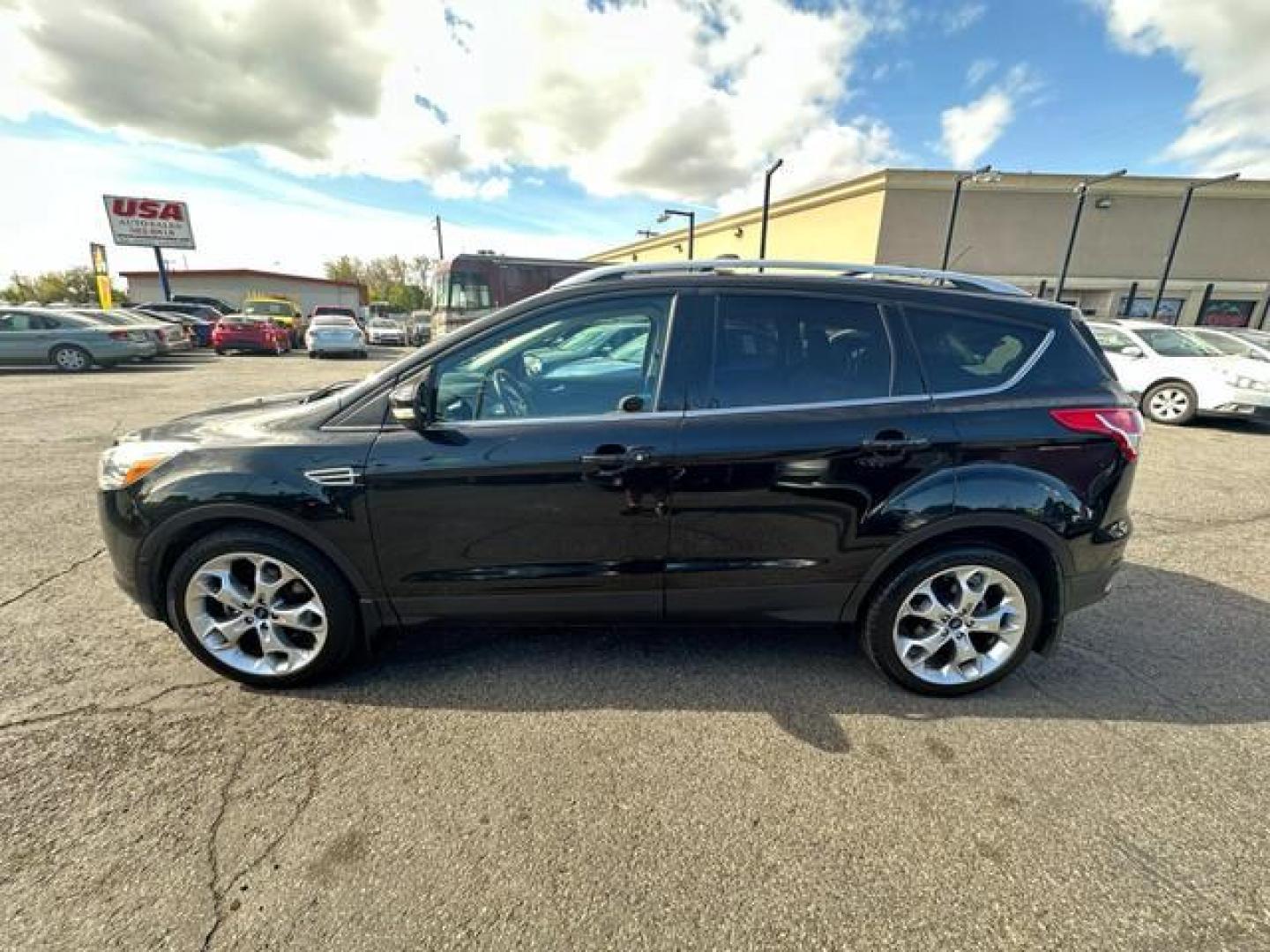 2014 Black /No Color Ford Escape Titanium Sport Utility 4D (1FMCU9J93EU) with an 4-Cyl, EcoBoost, 2.0L engine, Auto, 6-Spd w/SelShft transmission, located at 607 W Columbia Drive, Kennewick, WA, 99336, (509) 987-1069, 46.216743, -119.126404 - Photo#7