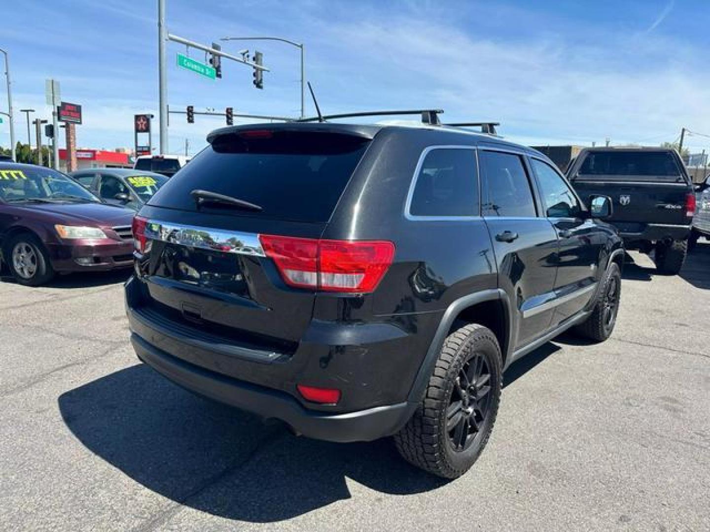 2011 Black Jeep Grand Cherokee Laredo Sport Utility 4D (1J4RR4GG9BC) with an V6, Flex Fuel, 3.6 Liter engine, Automatic, 5-Spd w/Overdrive transmission, located at 607 W Columbia Drive, Kennewick, WA, 99336, (509) 987-1069, 46.216743, -119.126404 - Photo#4