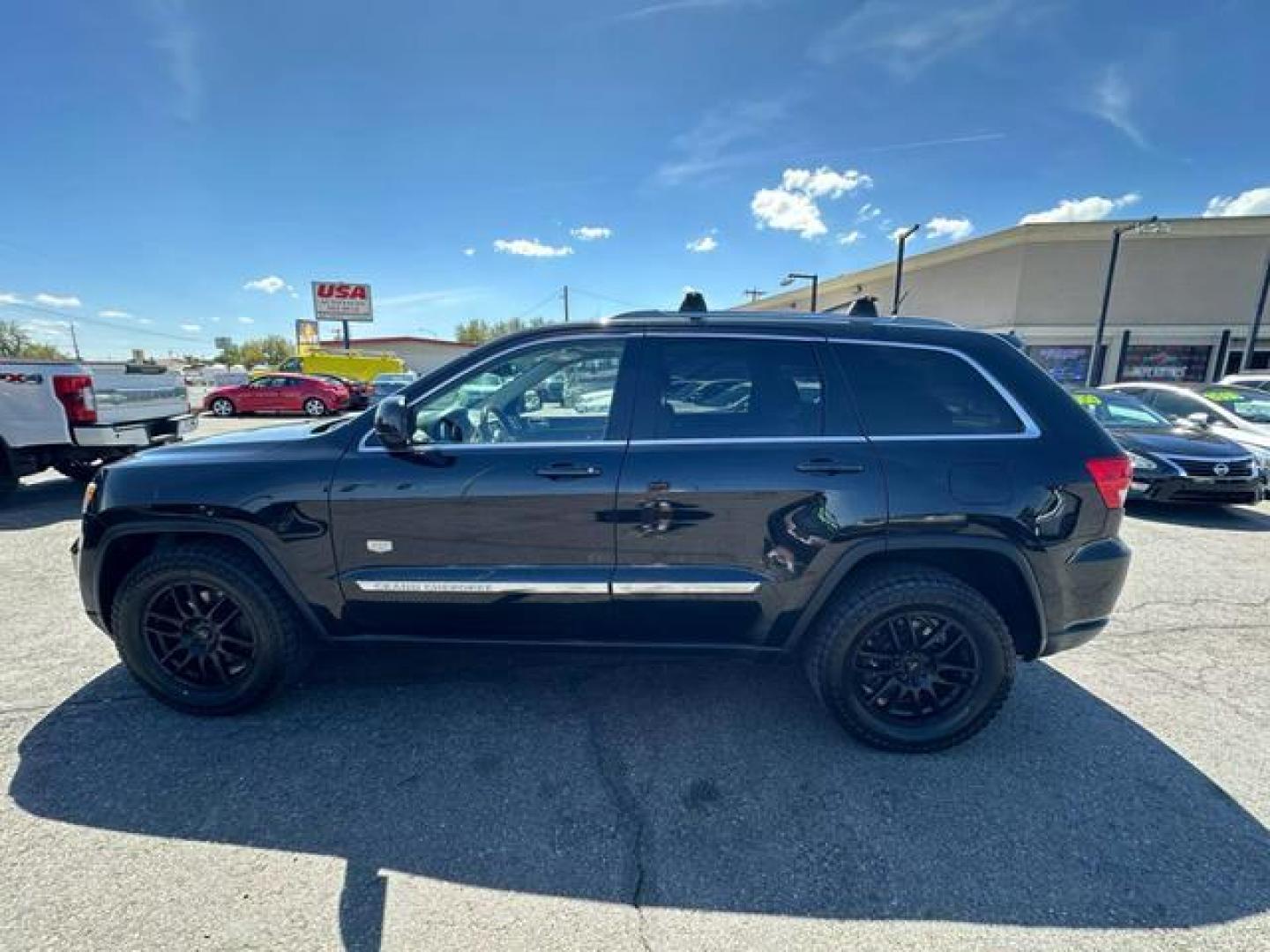 2011 Black Jeep Grand Cherokee Laredo Sport Utility 4D (1J4RR4GG9BC) with an V6, Flex Fuel, 3.6 Liter engine, Automatic, 5-Spd w/Overdrive transmission, located at 607 W Columbia Drive, Kennewick, WA, 99336, (509) 987-1069, 46.216743, -119.126404 - Photo#7