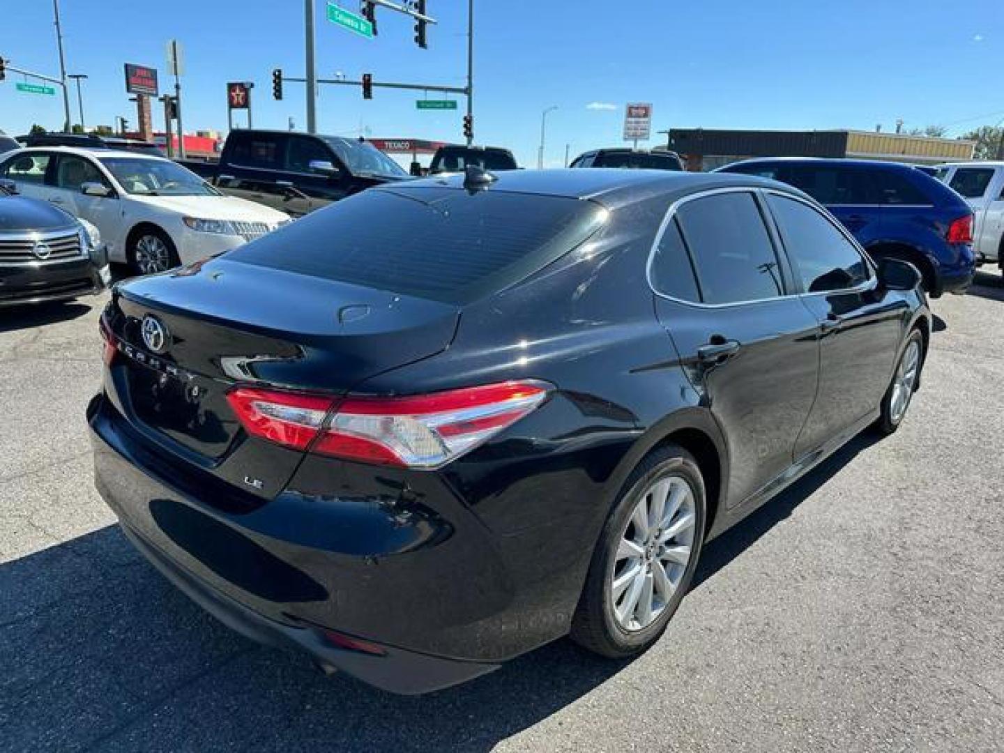 2019 Black Toyota Camry LE Sedan 4D (4T1B11HK1KU) with an 4-Cyl, 2.5 Liter engine, Automatic, 8-Spd w/Sequential Shift transmission, located at 607 W Columbia Drive, Kennewick, WA, 99336, (509) 987-1069, 46.216743, -119.126404 - Photo#4