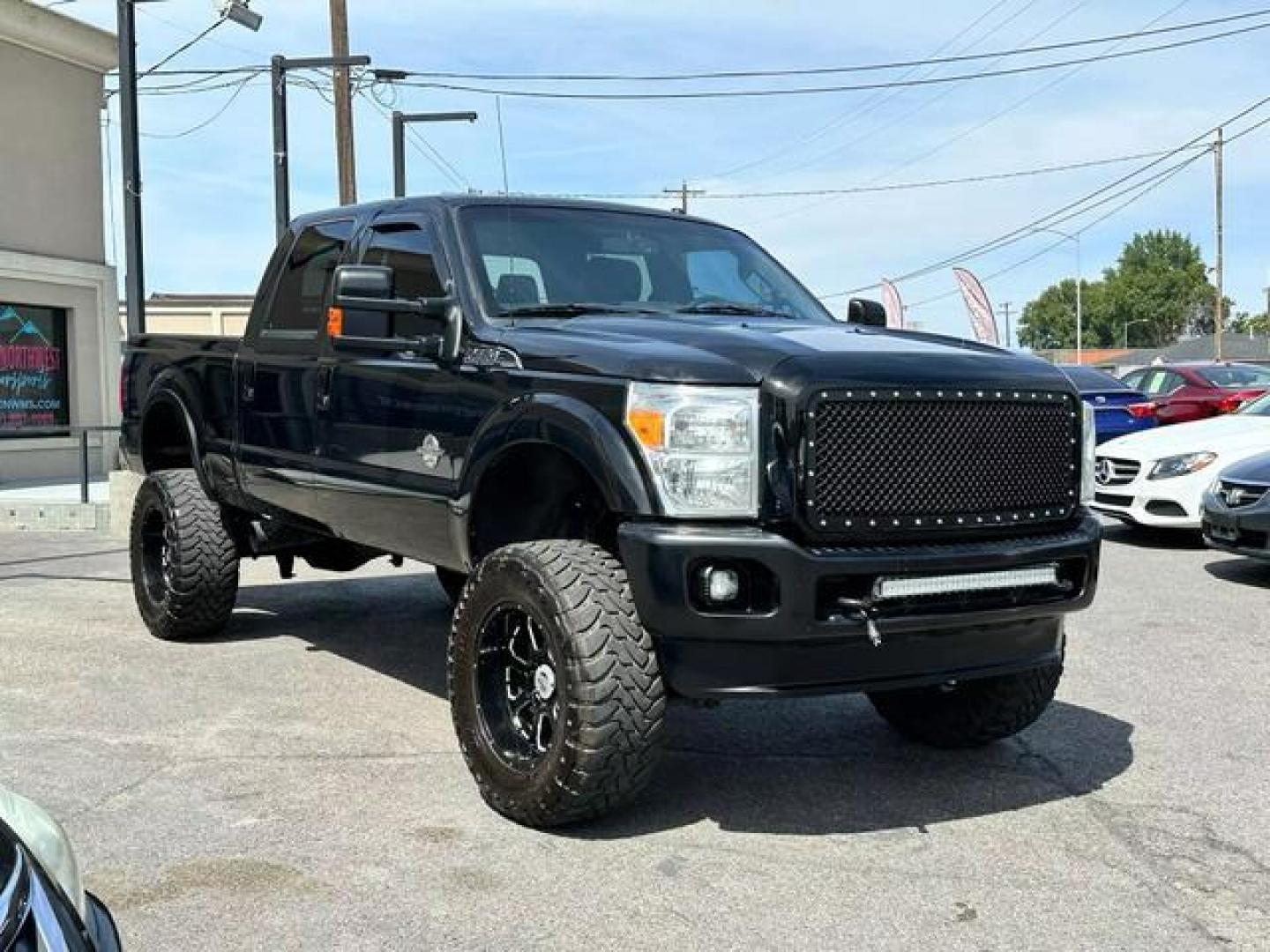 2013 Red /No Color Ford F350 Super Duty Crew Cab Lariat Pickup 4D 6 3/4 ft (1FT8W3BT1DE) with an V8, Turbo Diesel, 6.7 Liter engine, Auto HD 6-Spd SelectShift transmission, located at 607 W Columbia Drive, Kennewick, WA, 99336, (509) 987-1069, 46.216743, -119.126404 - Photo#2