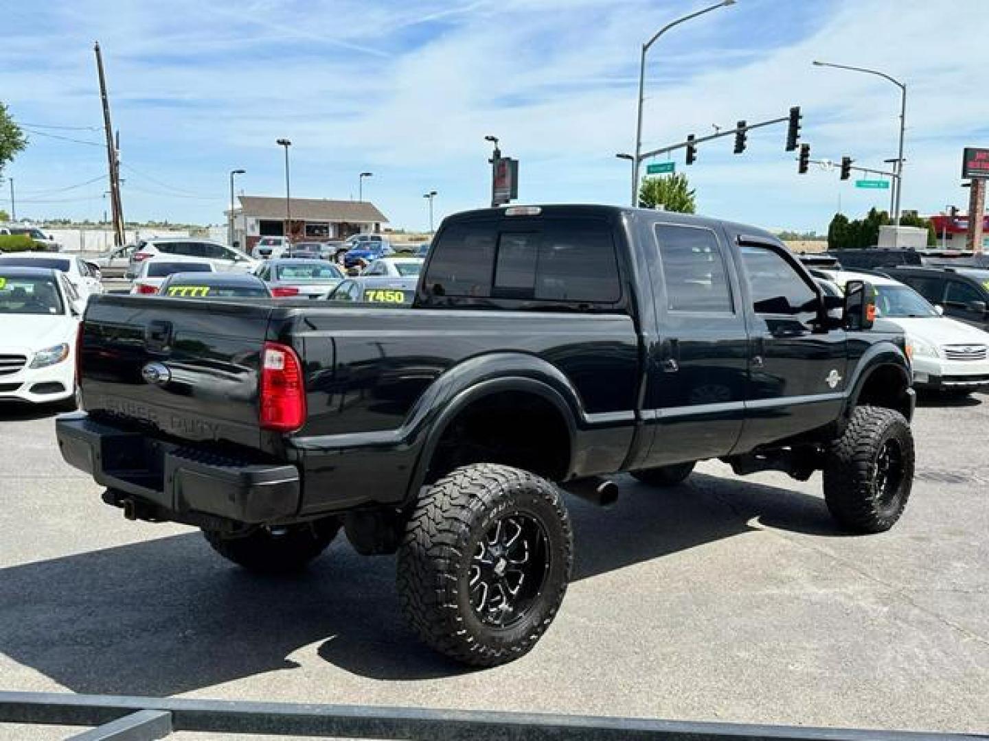 2013 Red /No Color Ford F350 Super Duty Crew Cab Lariat Pickup 4D 6 3/4 ft (1FT8W3BT1DE) with an V8, Turbo Diesel, 6.7 Liter engine, Auto HD 6-Spd SelectShift transmission, located at 607 W Columbia Drive, Kennewick, WA, 99336, (509) 987-1069, 46.216743, -119.126404 - Photo#4