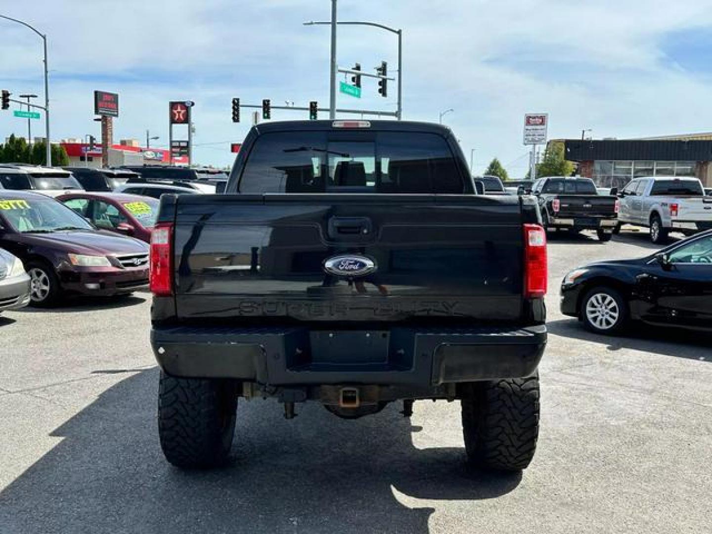 2013 Red /No Color Ford F350 Super Duty Crew Cab Lariat Pickup 4D 6 3/4 ft (1FT8W3BT1DE) with an V8, Turbo Diesel, 6.7 Liter engine, Auto HD 6-Spd SelectShift transmission, located at 607 W Columbia Drive, Kennewick, WA, 99336, (509) 987-1069, 46.216743, -119.126404 - Photo#5