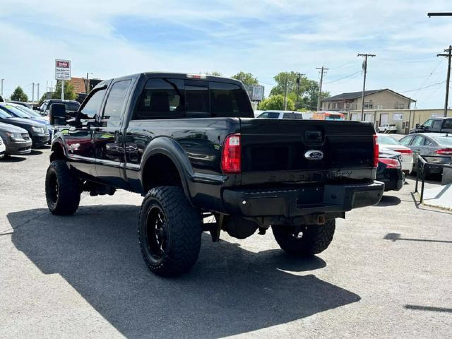 2013 Red /No Color Ford F350 Super Duty Crew Cab Lariat Pickup 4D 6 3/4 ft (1FT8W3BT1DE) with an V8, Turbo Diesel, 6.7 Liter engine, Auto HD 6-Spd SelectShift transmission, located at 607 W Columbia Drive, Kennewick, WA, 99336, (509) 987-1069, 46.216743, -119.126404 - Photo#6