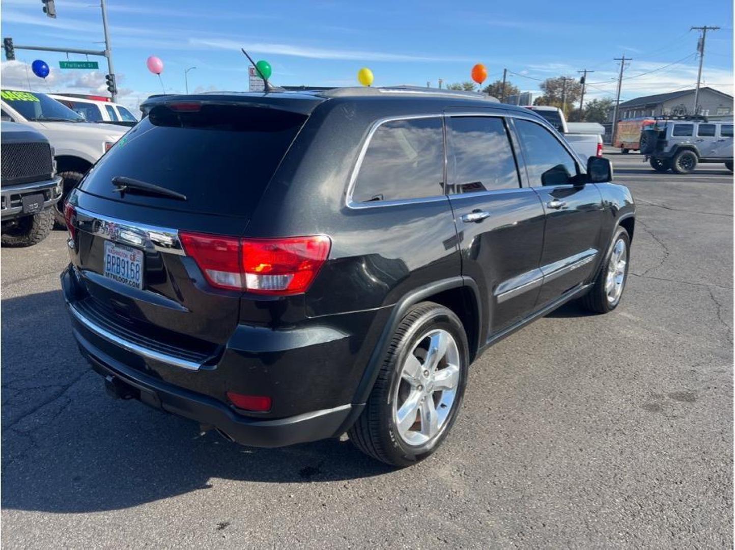 2012 Black /No Color Jeep Grand Cherokee (1C4RJFCT3CC) with an V8, 5.7 Liter engine, Automatic, 5-Spd transmission, located at 607 W Columbia Drive, Kennewick, WA, 99336, (509) 987-1069, 46.216743, -119.126404 - Photo#4