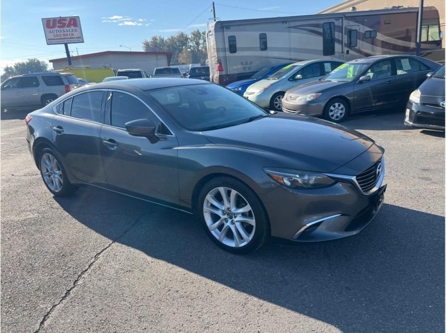 2017 Gray /No Color Mazda MAZDA6 (JM1GL1V54H1) with an 4-Cyl PZEV SKYACTIV-G 2.5L engine, Auto, 6-Spd Spt Manual transmission, located at 607 W Columbia Drive, Kennewick, WA, 99336, (509) 987-1069, 46.216743, -119.126404 - Photo#2