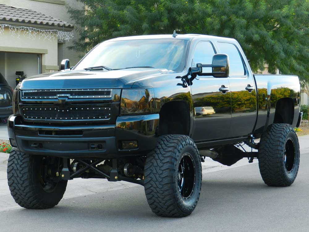 All-black lifted Chevy pickup truck